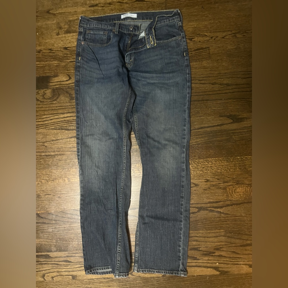 Dark wash Levi’s denim jeans